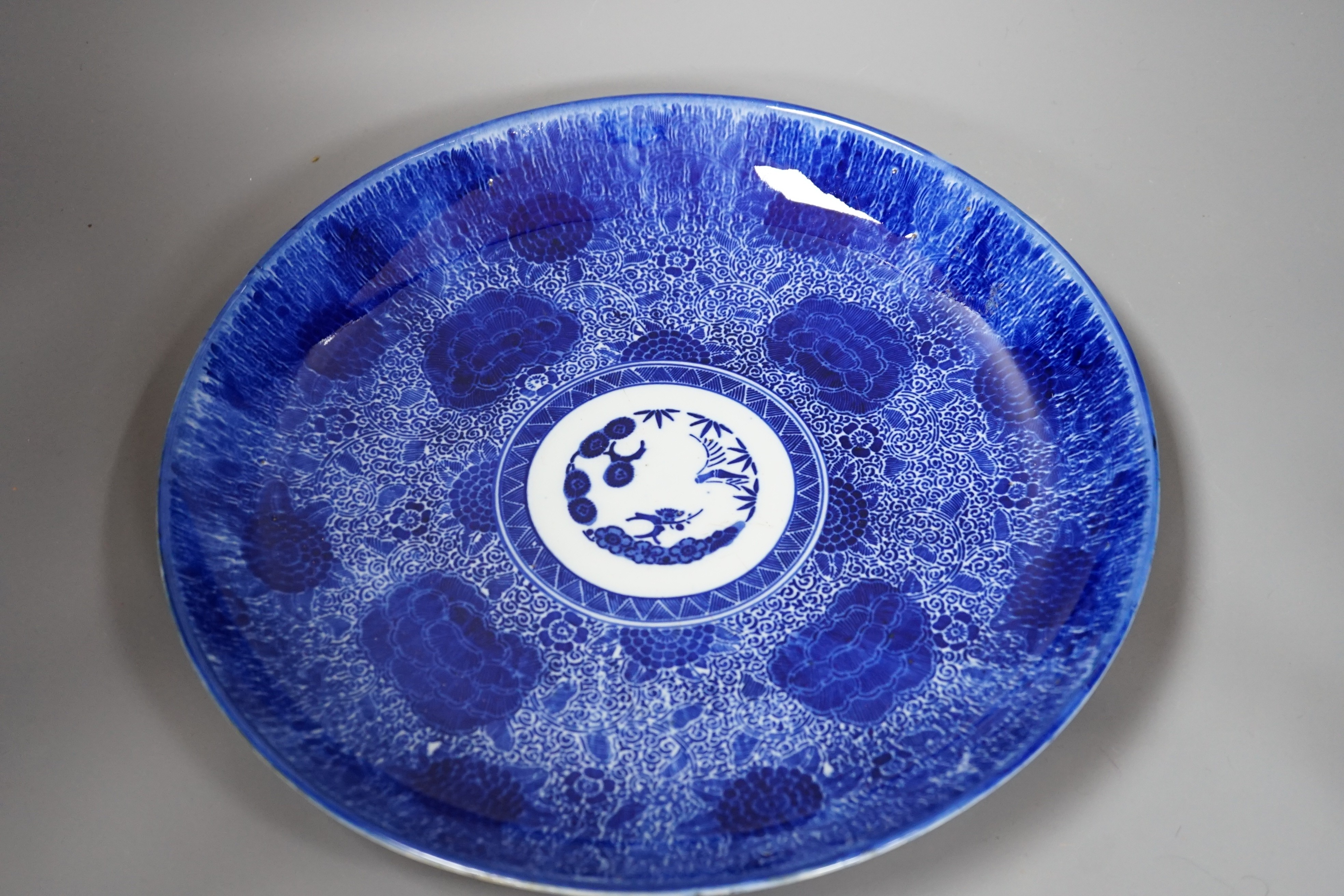 A Japanese Blue and White dish, a Set of Shibayama buttons, a soapstone rabbit, a Siamese cuff links and tie clip. Dish diameter 35cm